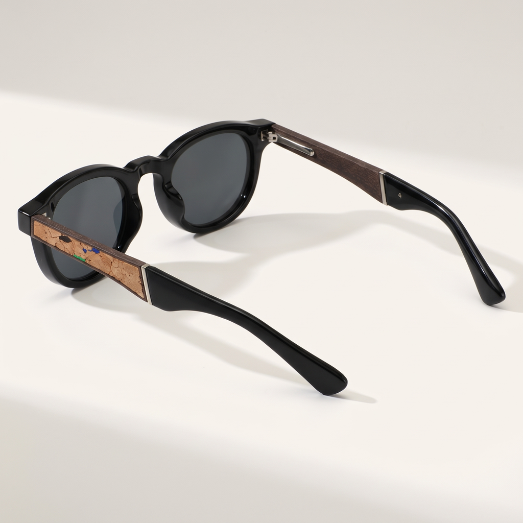 Black | three-quarter view showing the cork temple inlay
