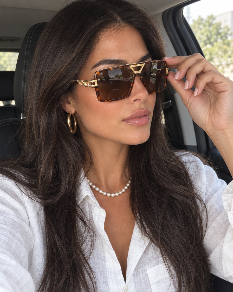 Bruna leopard double-beam sunglasses worn by a model